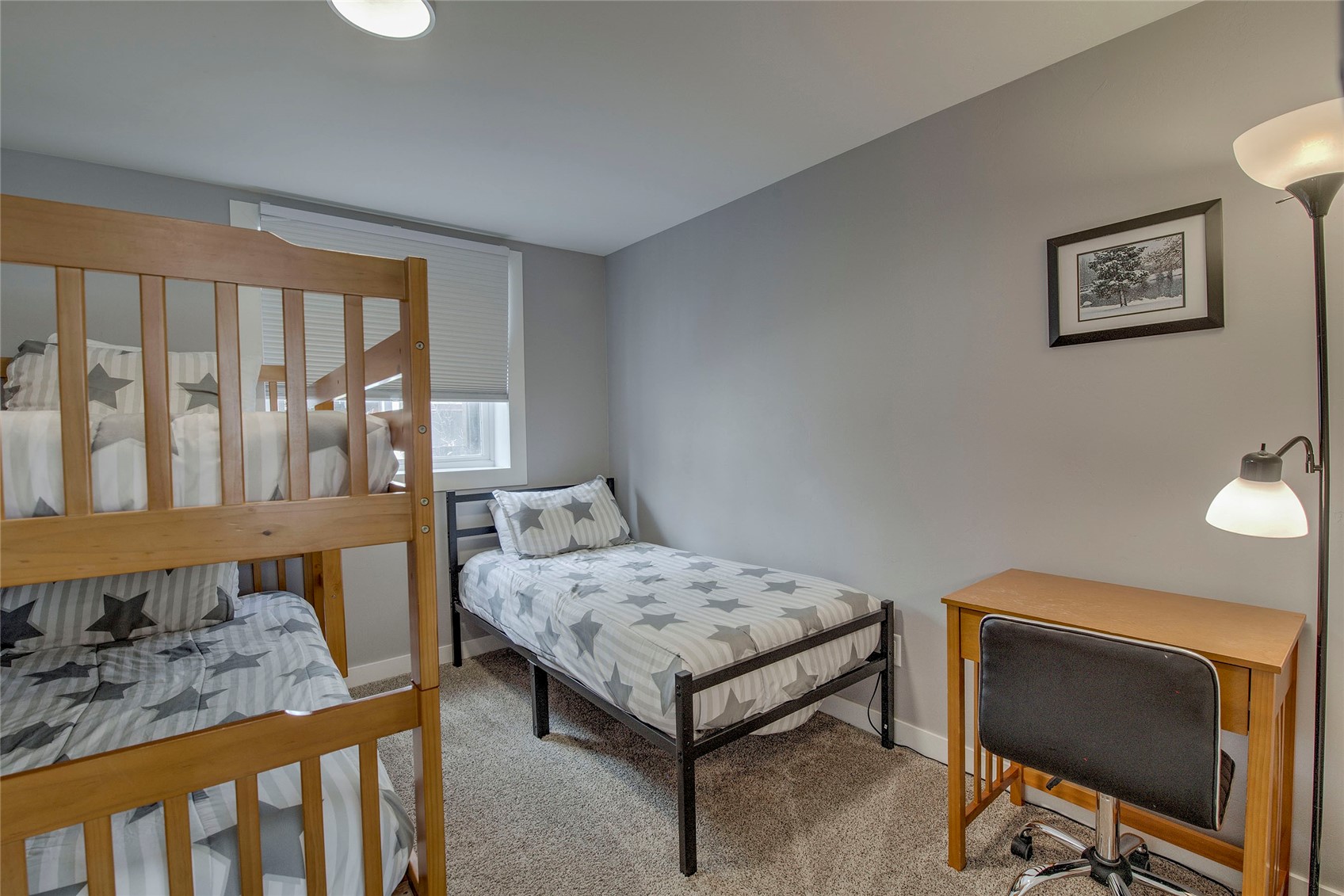 472 Ryan Gulch Road Silverthorne, CO 80498 - Photo 21 of 36 a bedroom with furniture and a window