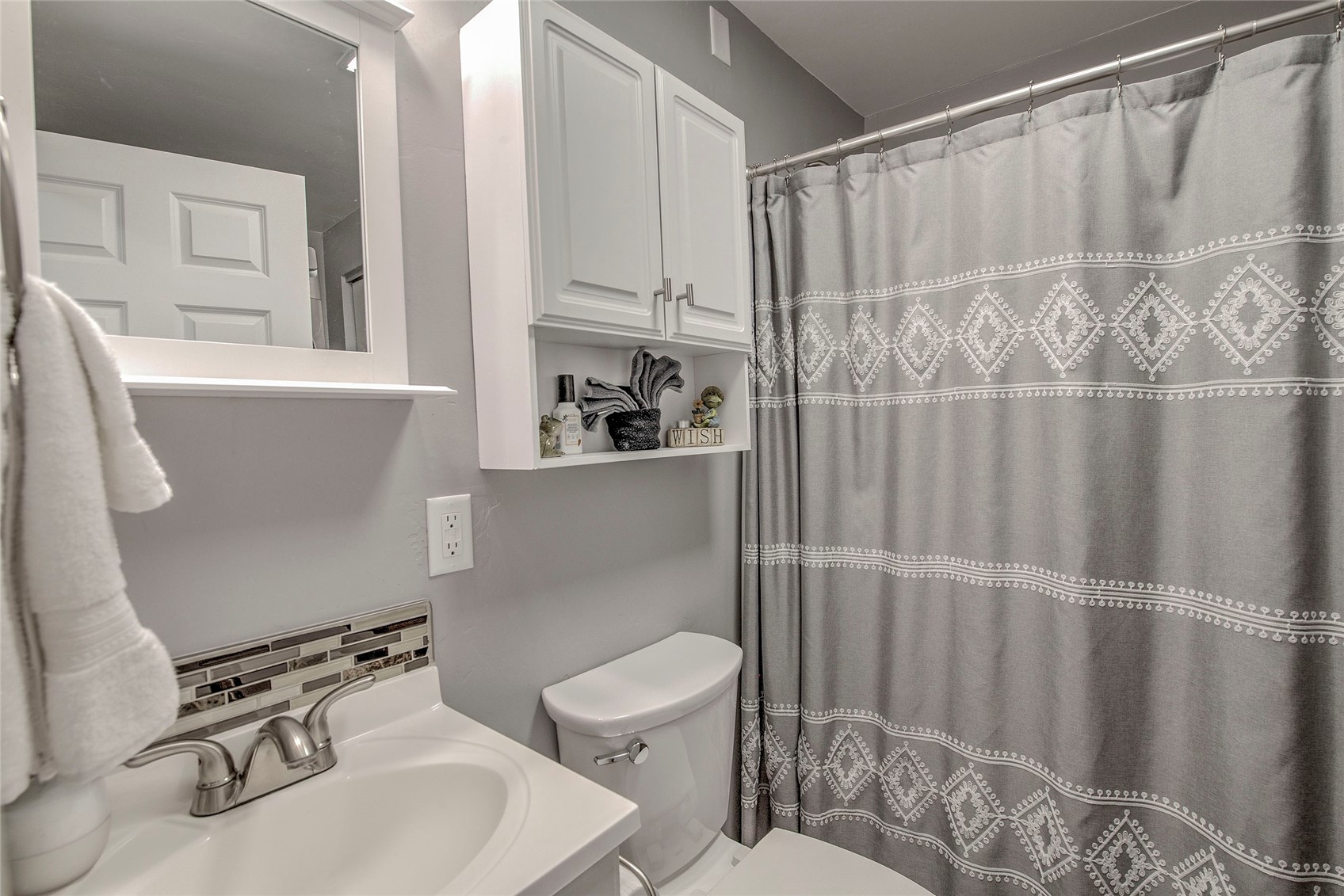 472 Ryan Gulch Road Silverthorne, CO 80498 - Photo 23 of 36 a bathroom with a sink a toilet and shower