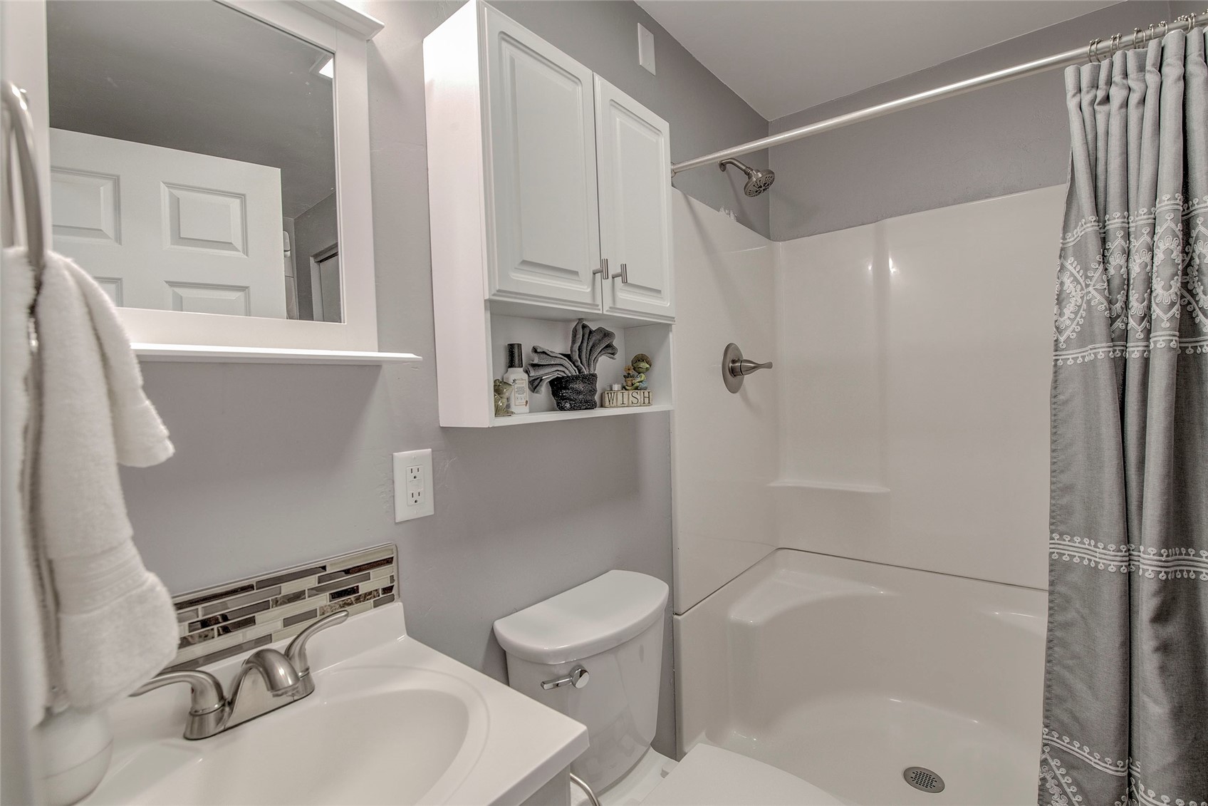 472 Ryan Gulch Road Silverthorne, CO 80498 - Photo 24 of 36 a bathroom with a sink toilet and shower