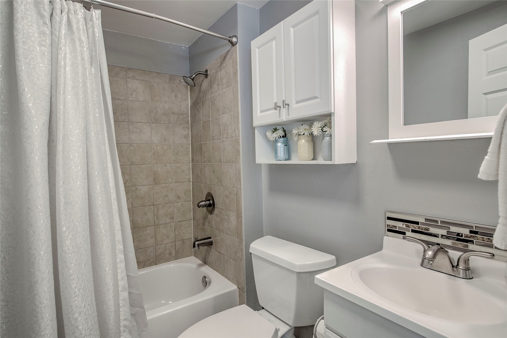 472 Ryan Gulch Road Silverthorne, CO 80498 - Photo 26 of 36 a bathroom with a sink toilet and shower