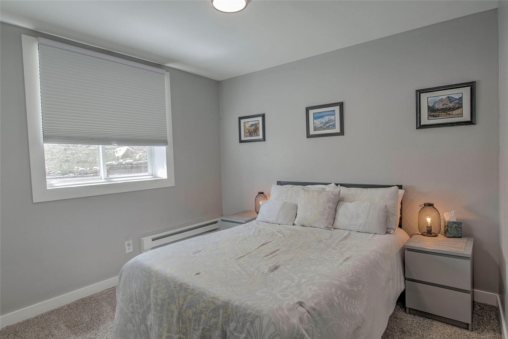 472 Ryan Gulch Road Silverthorne, CO 80498 - Photo 28 of 36 a bedroom with a bed and window