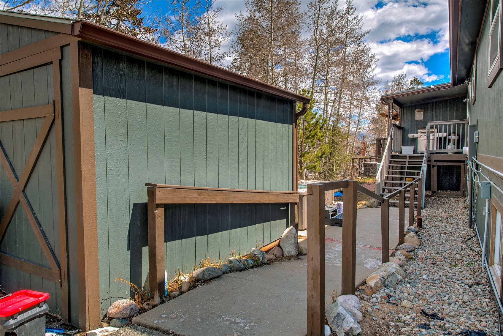 472 Ryan Gulch Road Silverthorne, CO 80498 - Photo 33 of 36 a view of a house with a wooden deck
