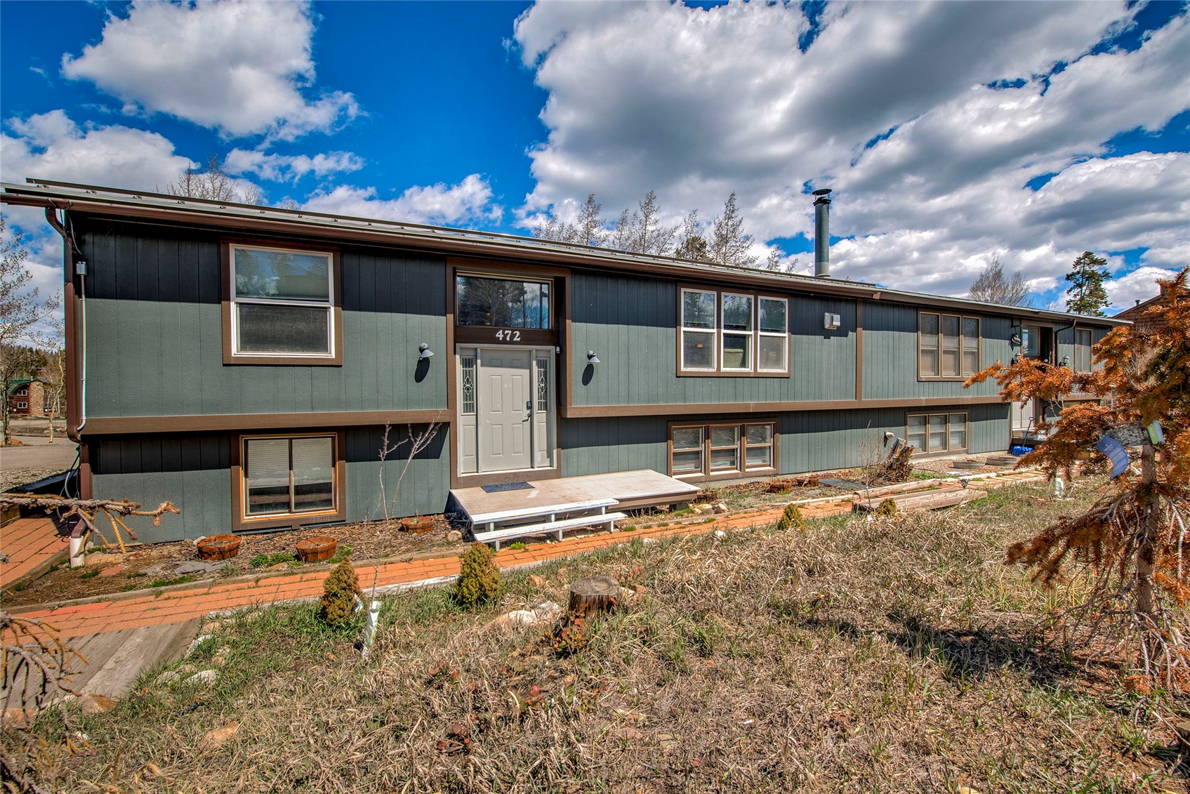 472 Ryan Gulch Road Silverthorne, CO 80498 - Photo 36 of 36 front view of a house with a yard