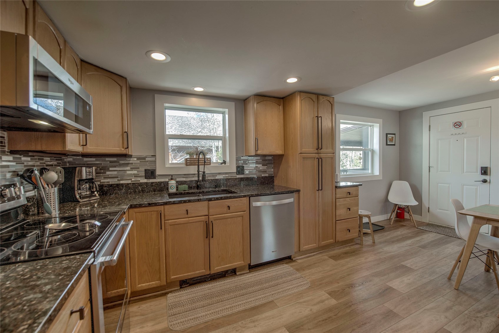472 Ryan Gulch Road Silverthorne, CO 80498 - Photo 8 of 36 a kitchen with a sink appliances and cabinets
