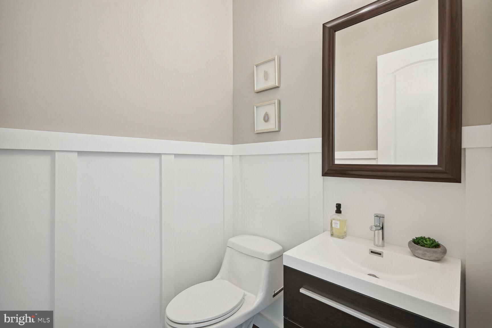 6701 Lumsden Street McLean, VA 22101 - Photo 18 of 57 a bathroom with a sink vanity and toilet