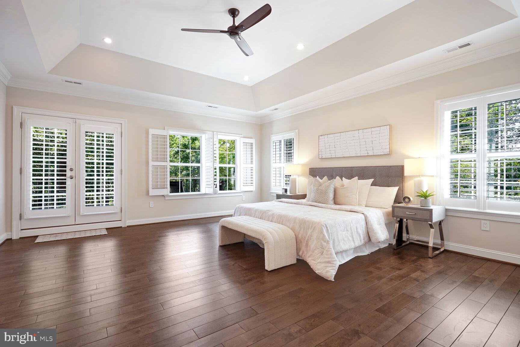 6701 Lumsden Street McLean, VA 22101 - Photo 19 of 57 a bedroom with a large bed and a large window