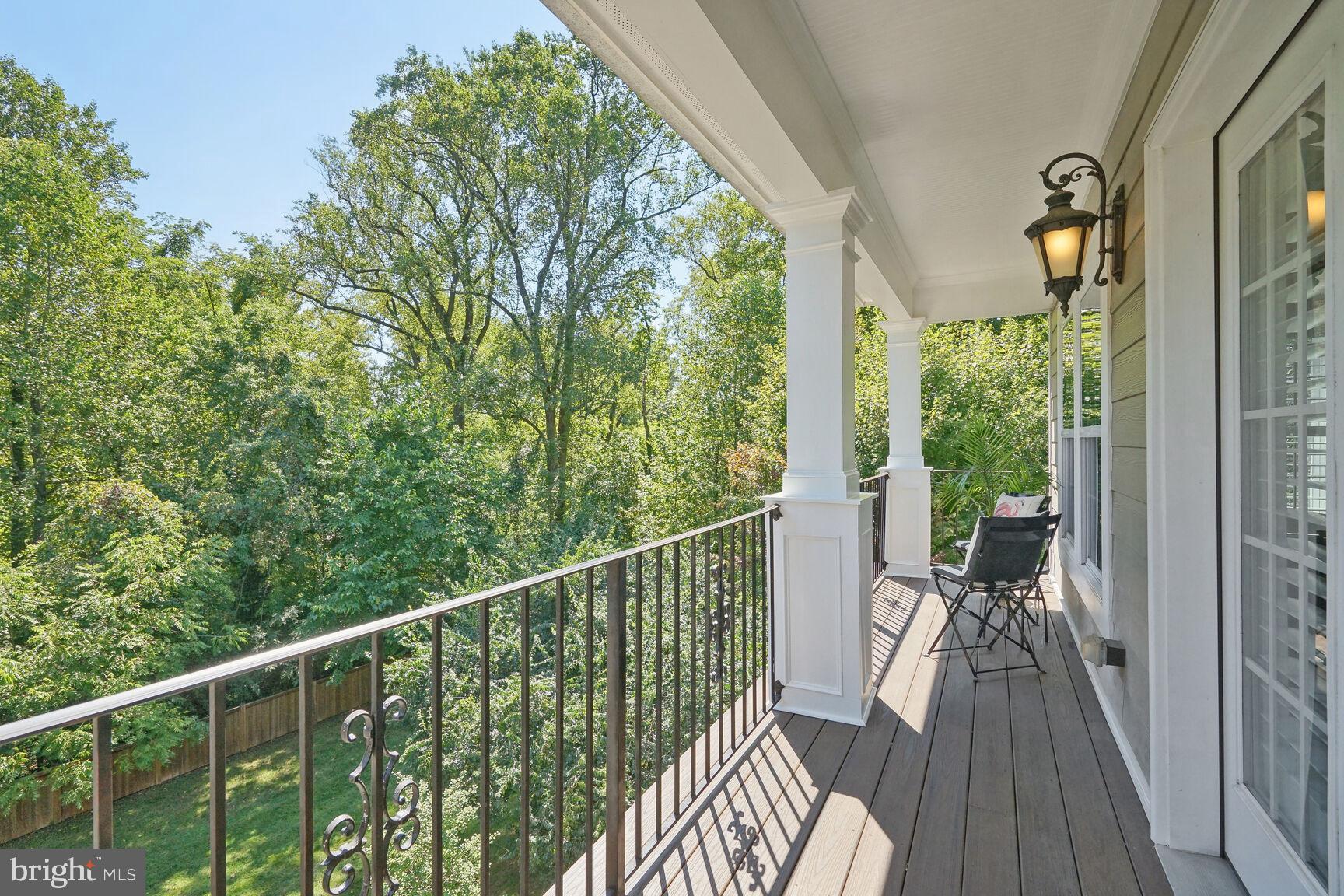 6701 Lumsden Street McLean, VA 22101 - Photo 22 of 57 a view of a balcony with wooden floor