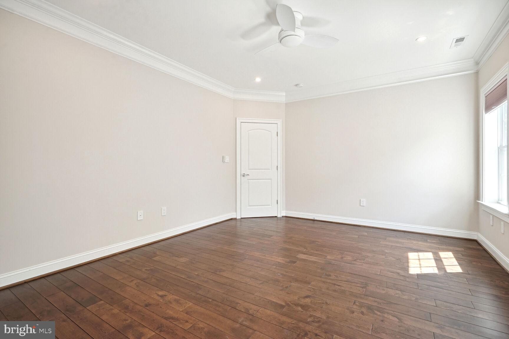 6701 Lumsden Street McLean, VA 22101 - Photo 33 of 57 a view of an empty room with wooden floor