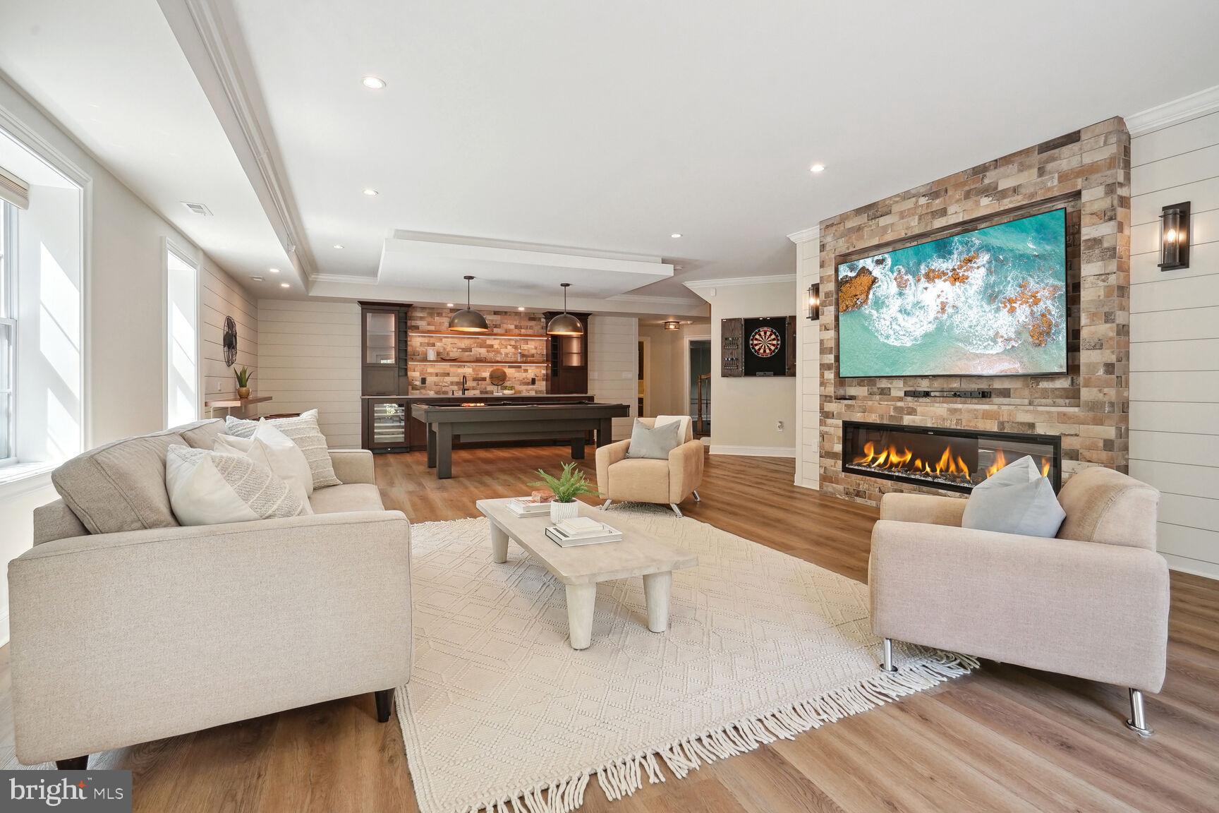 6701 Lumsden Street McLean, VA 22101 - Photo 38 of 57 a living room with furniture and a flat screen tv