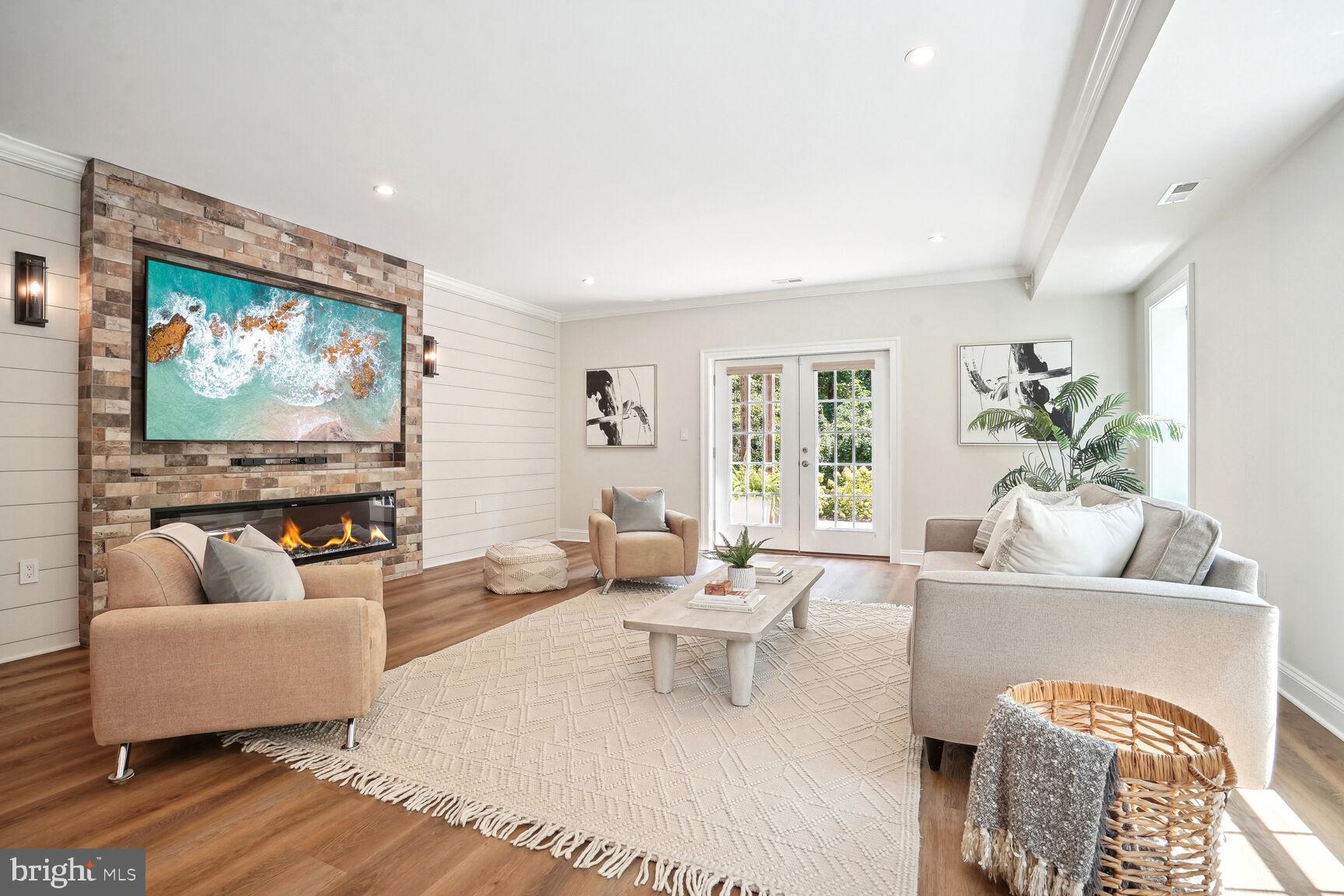 6701 Lumsden Street McLean, VA 22101 - Photo 39 of 57 a living room with furniture and a flat screen tv
