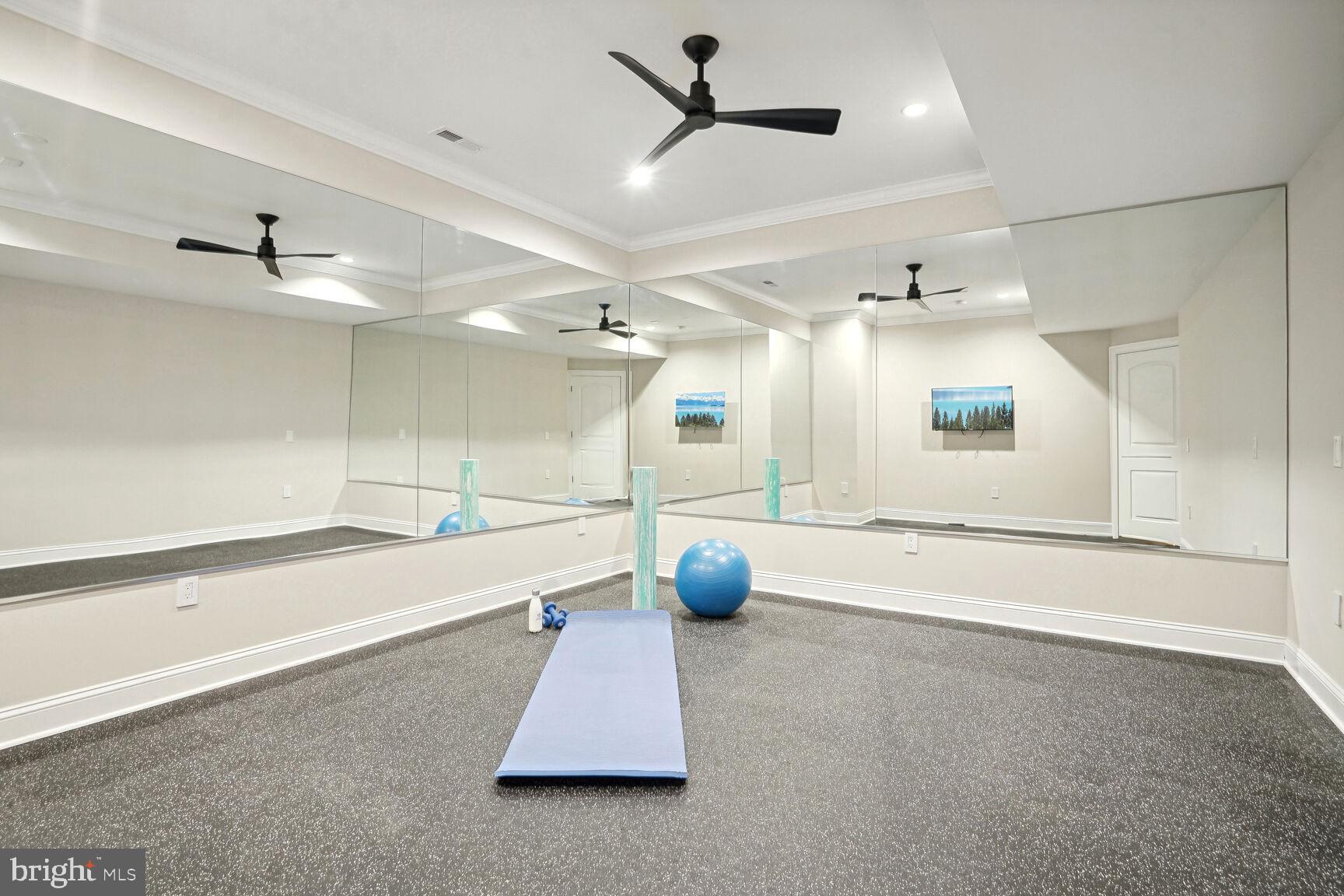 6701 Lumsden Street McLean, VA 22101 - Photo 43 of 57 a bathroom with a tub a sink and mirrors