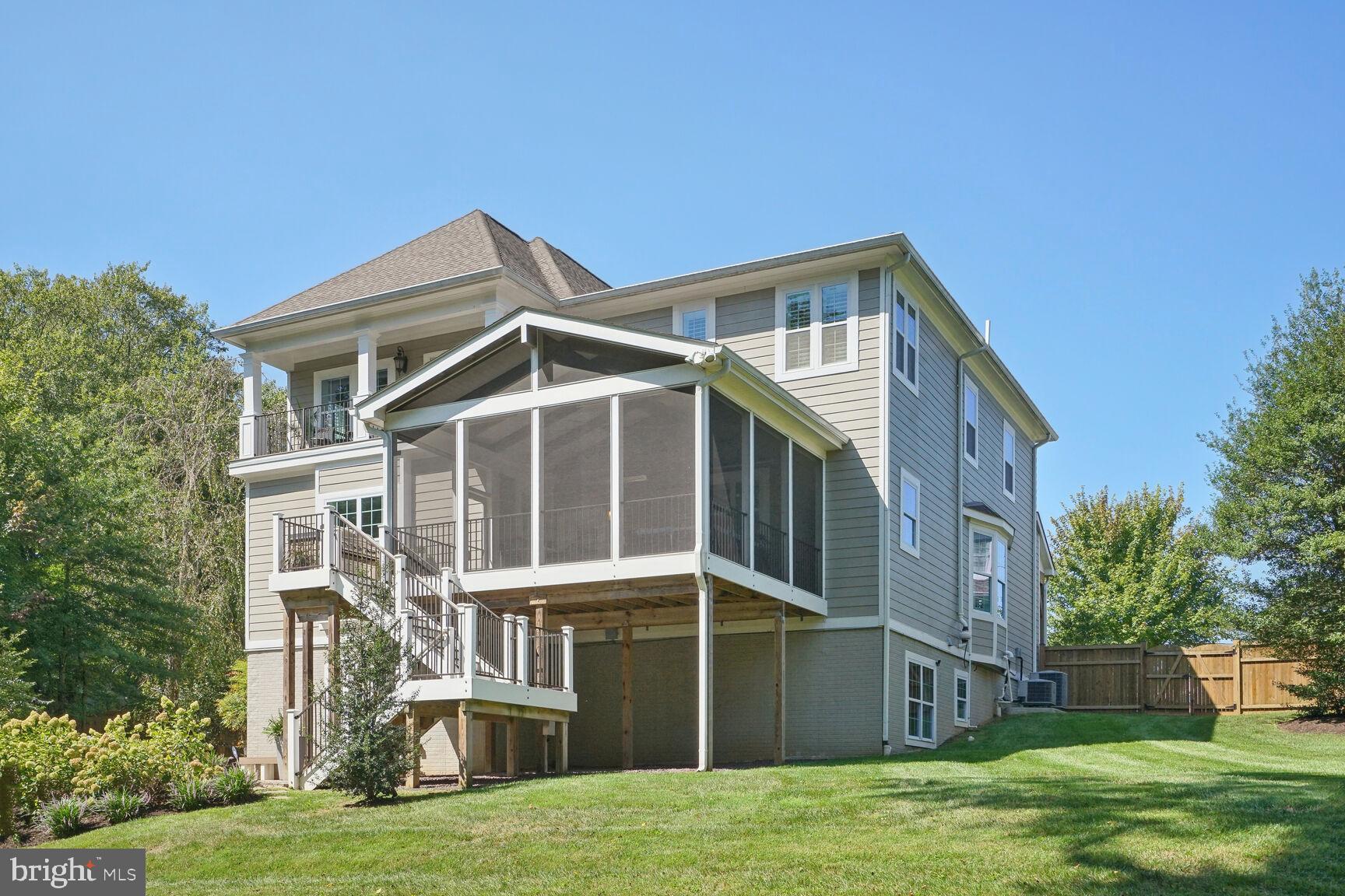 6701 Lumsden Street McLean, VA 22101 - Photo 48 of 57 a front view of a house with a yard