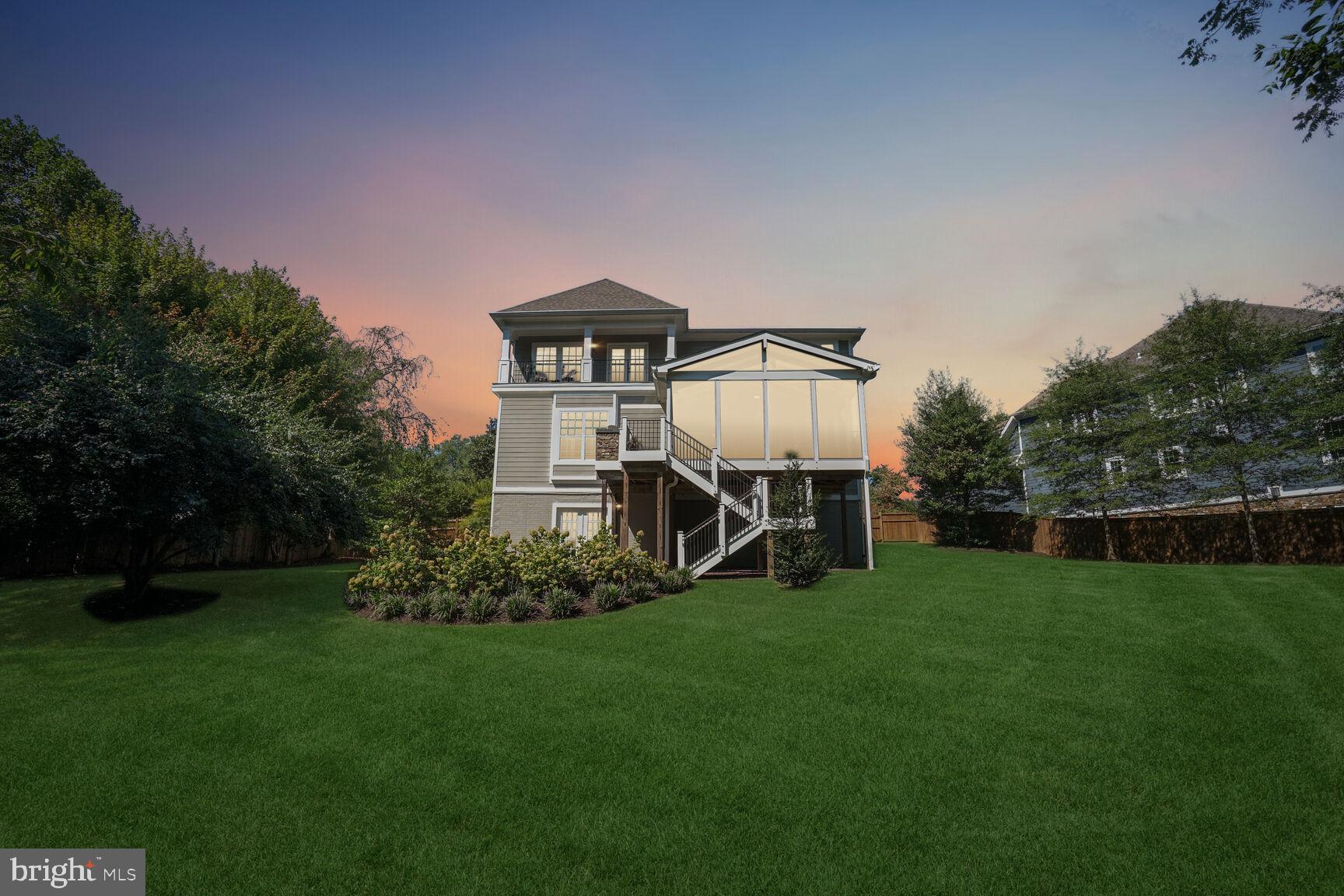 6701 Lumsden Street McLean, VA 22101 - Photo 51 of 57 a view of a house with a yard and sitting area