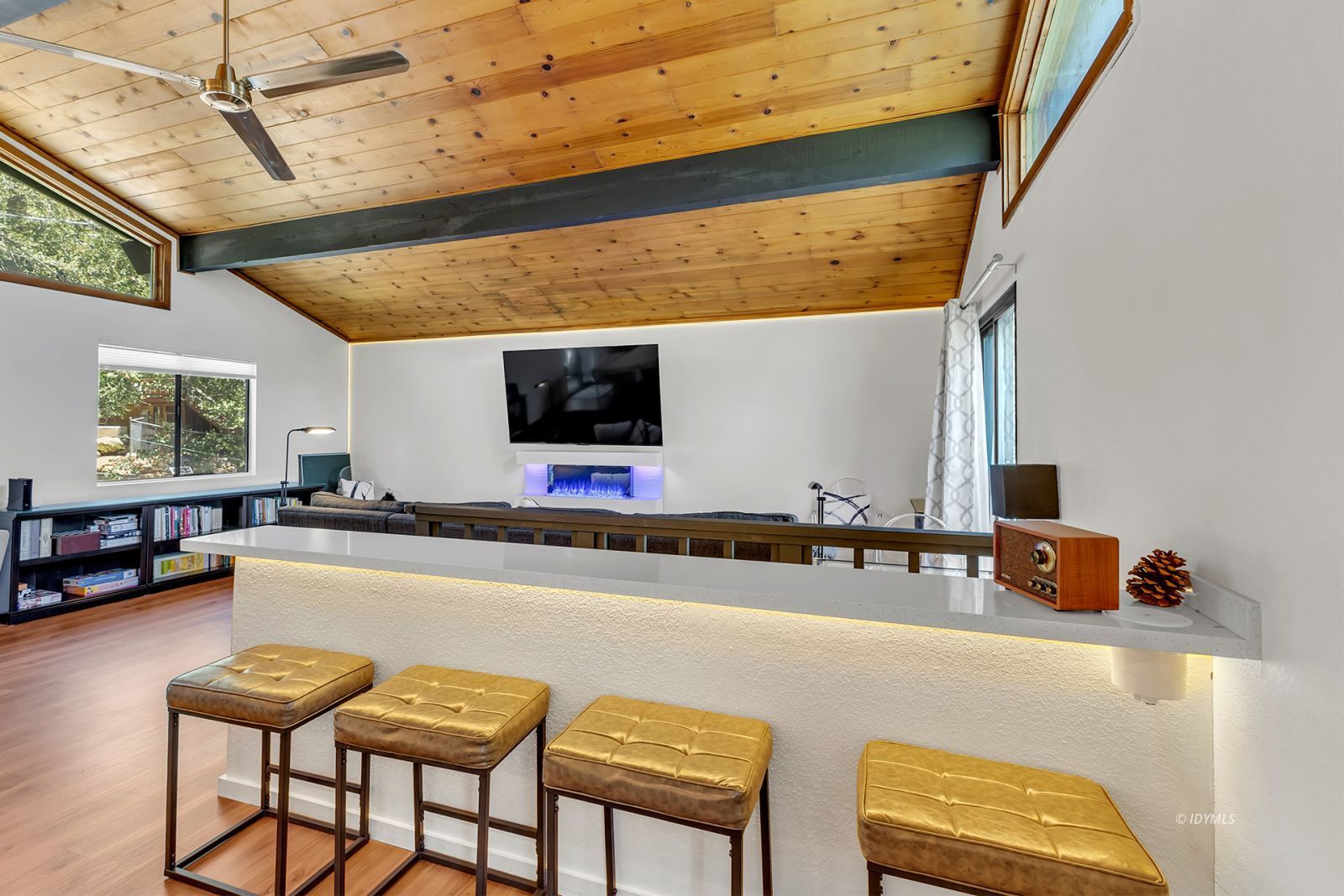 25595 Glen Road Idyllwild, CA 92549 - Photo 27 of 51 a living room with furniture and a flat screen tv