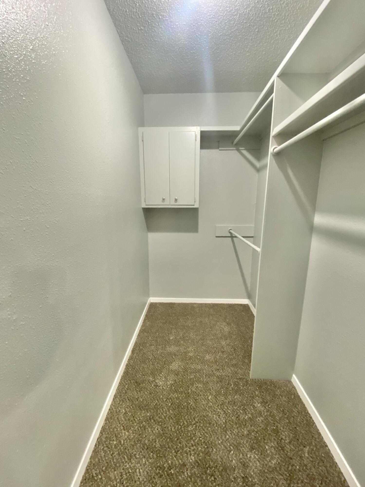 4707 48th Street Lubbock, TX 79414 - Photo 11 of 18 a view of walk in closet