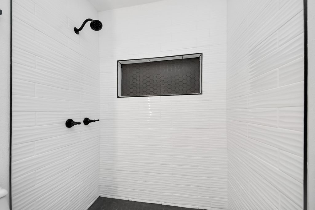 1014 Graham Drive Tomball, TX 77375 - Photo 20 of 37 a bathroom with a shower