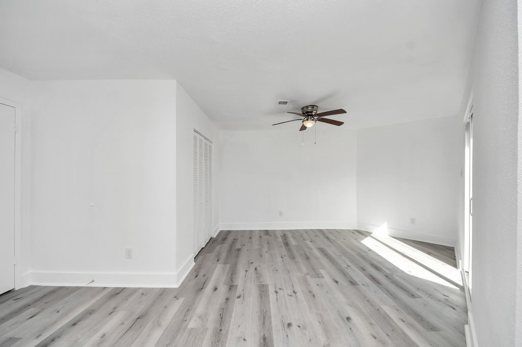 1014 Graham Drive Tomball, TX 77375 - Photo 26 of 37 a view of a room with wooden floor and window