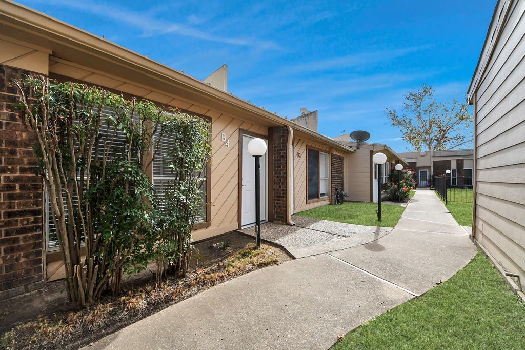 1014 Graham Drive Tomball, TX 77375 - Photo 32 of 37 a view of a house with backyard and porch