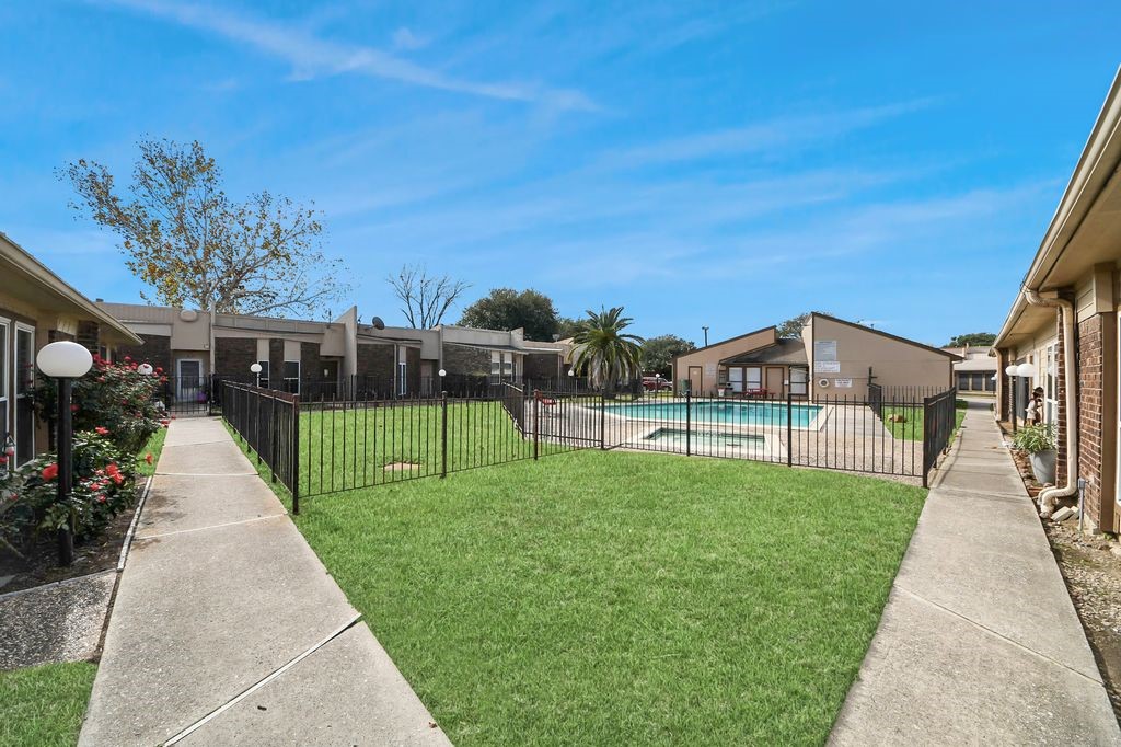 1014 Graham Drive Tomball, TX 77375 - Photo 35 of 37 a view of a garden with a pathway