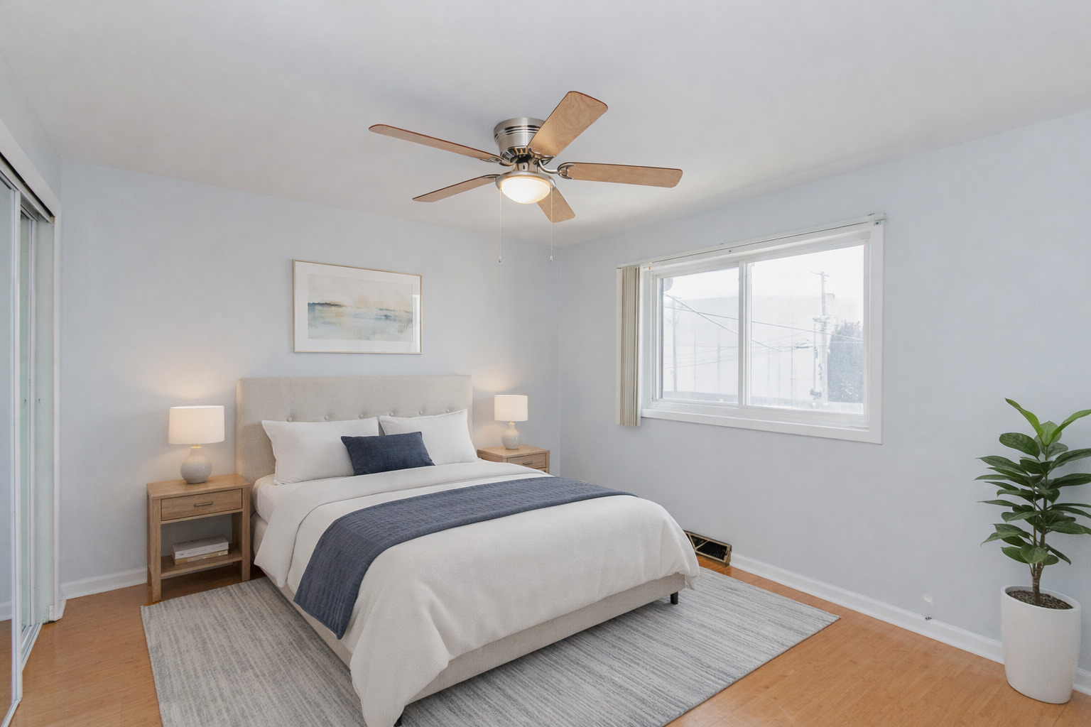 612 Maple Court, Unit 612 Mount Prospect, IL 60056 - Photo 7 of 12 a bedroom with a bed and a potted plant