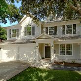 a front view of a house with yard