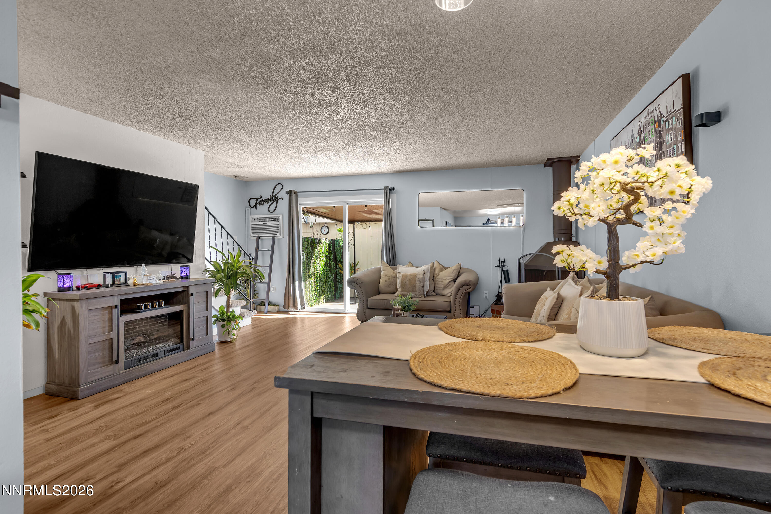 562 Smithridge Park Reno, NV 89502 - Photo 11 of 43 a living room with furniture and a flat screen tv