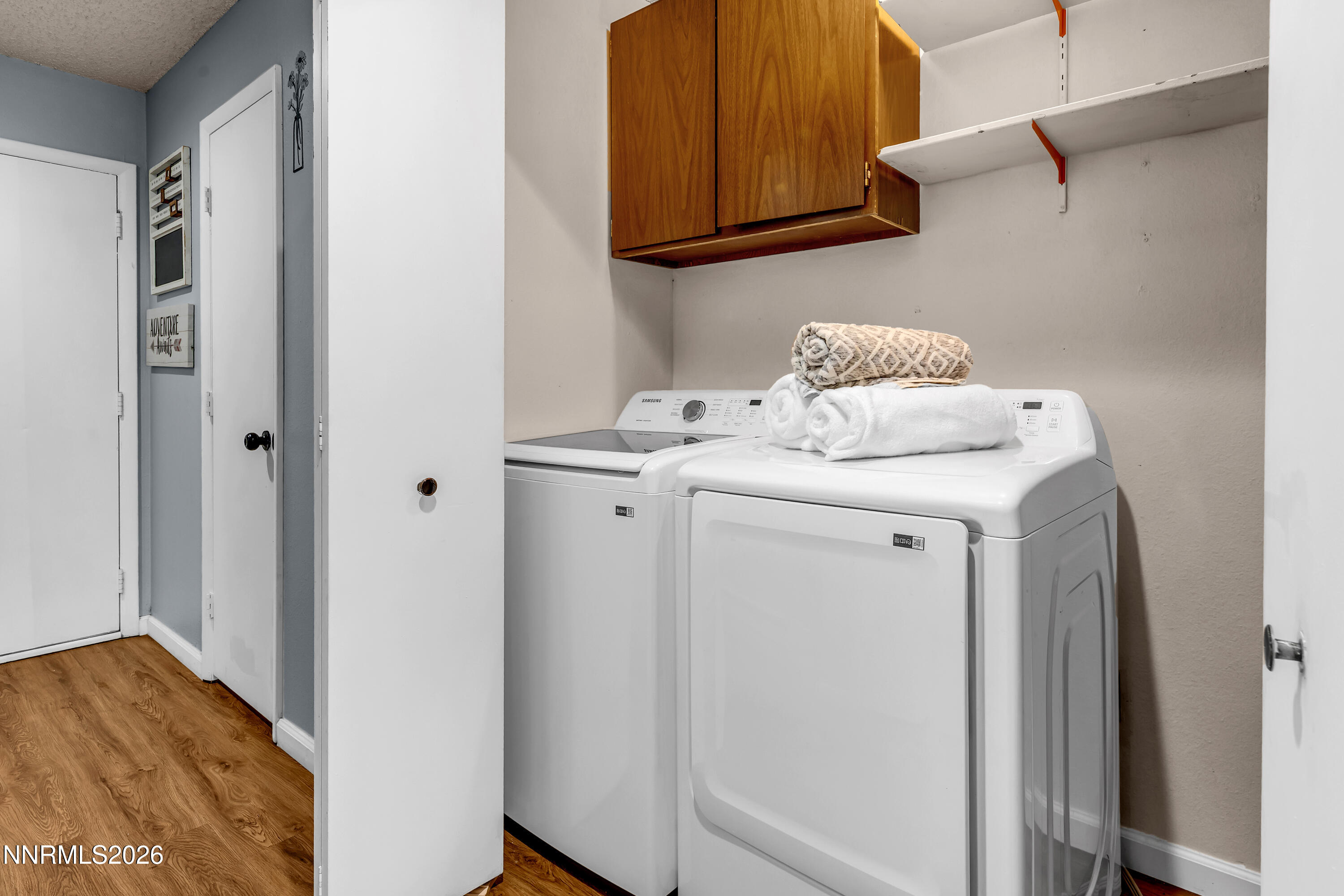 562 Smithridge Park Reno, NV 89502 - Photo 17 of 43 a utility room with dryer and washer