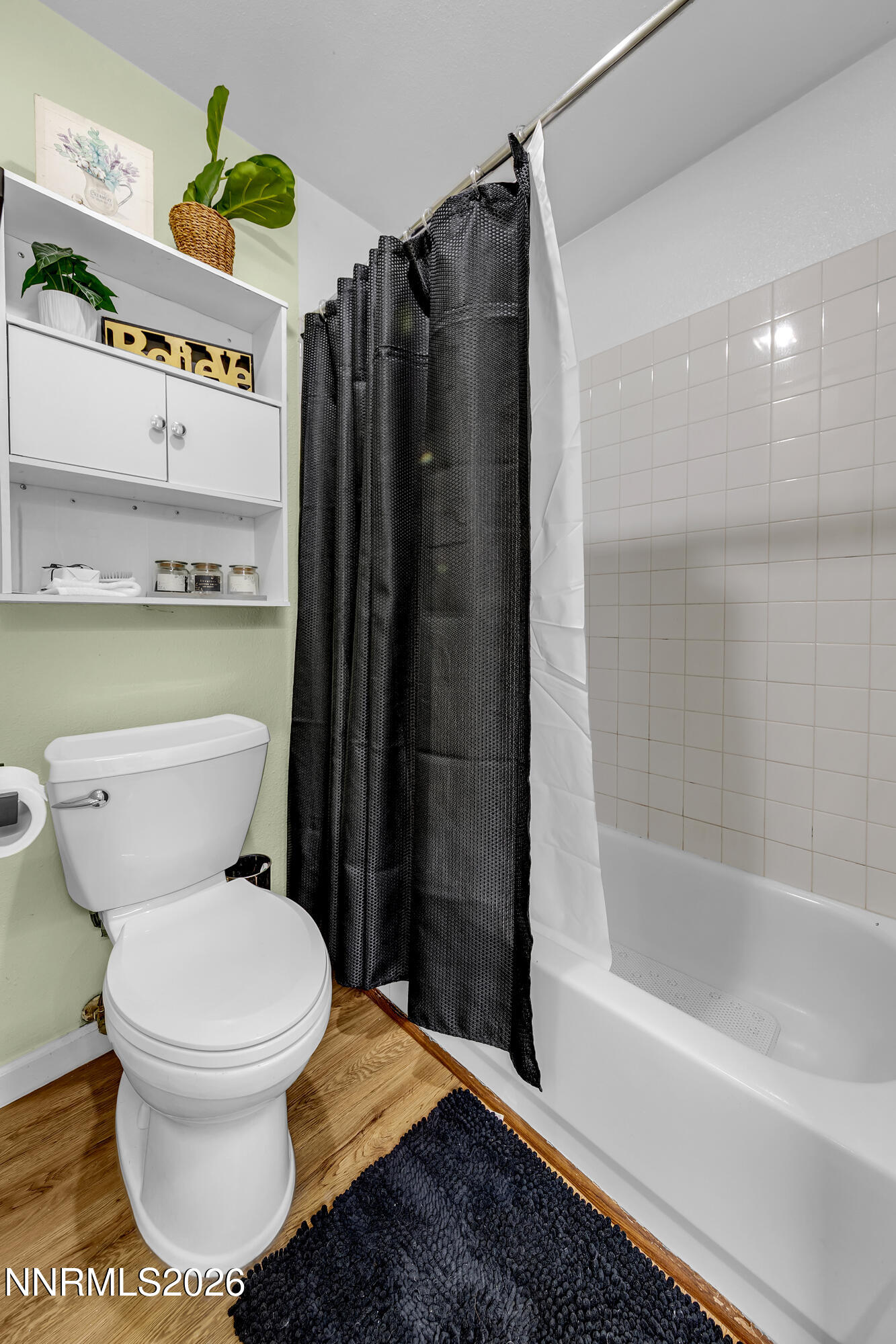 562 Smithridge Park Reno, NV 89502 - Photo 21 of 43 a bathroom with a toilet and a shower