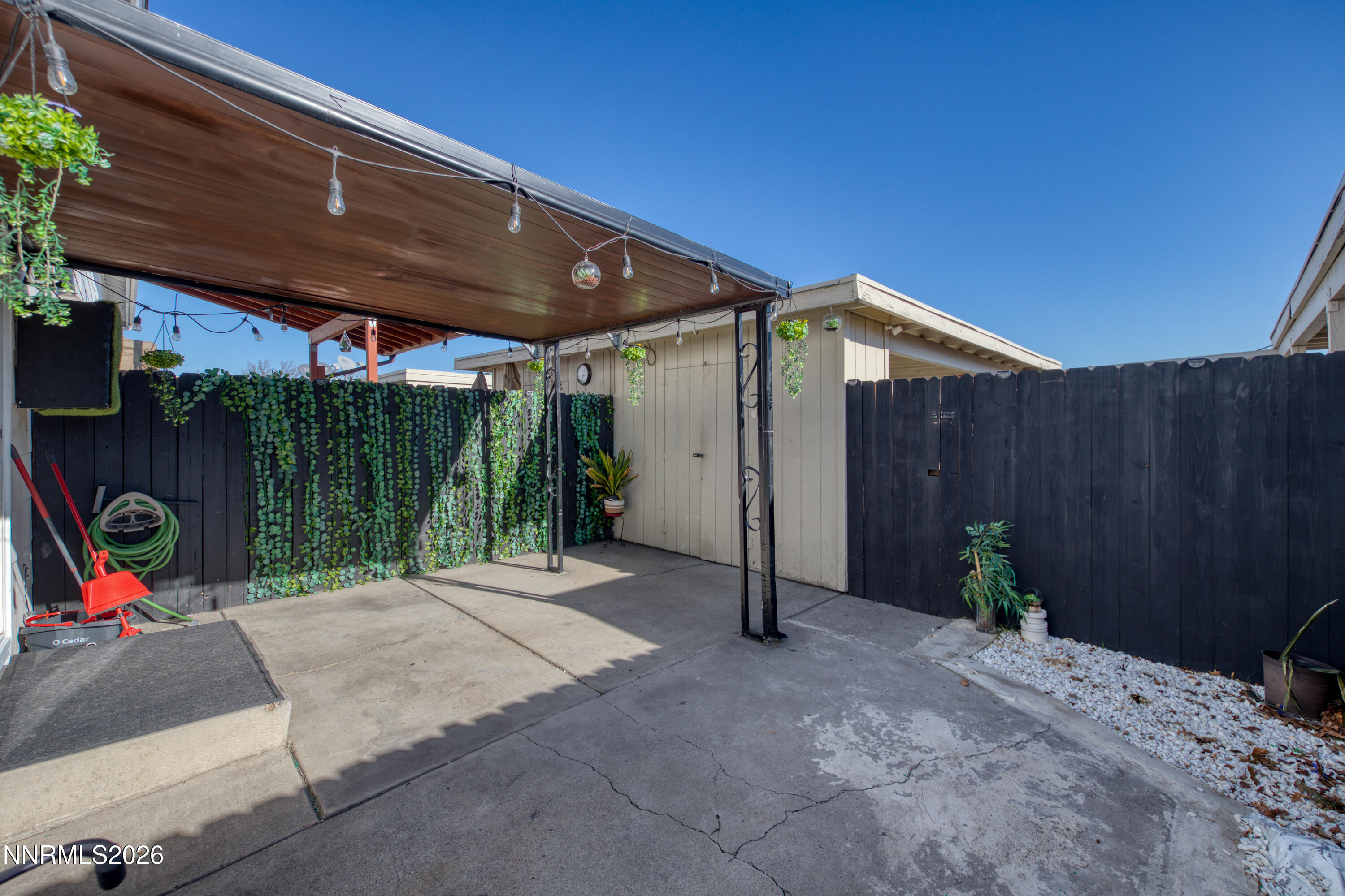 562 Smithridge Park Reno, NV 89502 - Photo 28 of 43 a backyard of a house with table and chairs