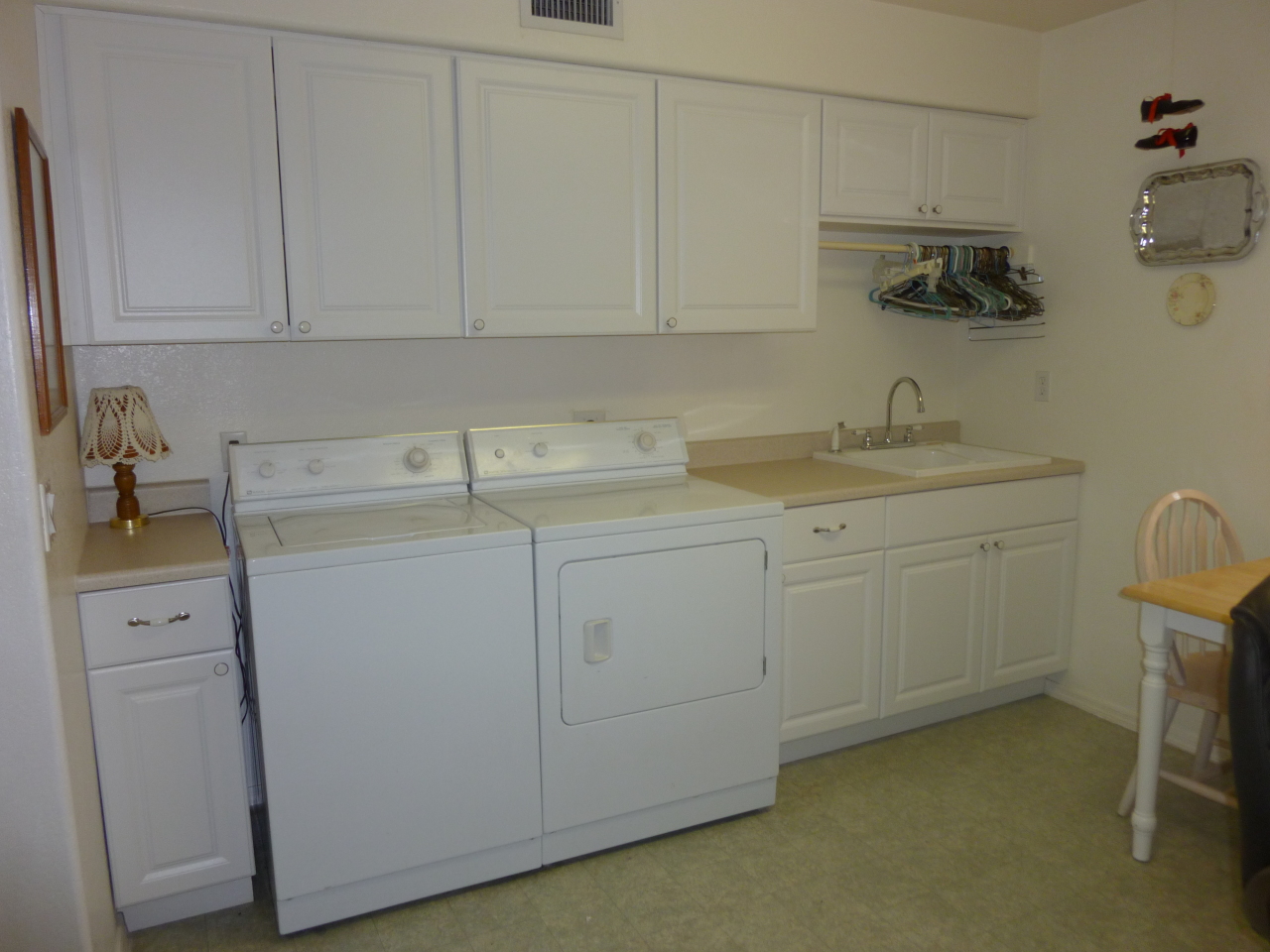 6911 West Del Rio Street Chandler, AZ 85226 - Photo 9 of 17 HUGE Laundry Room/Sink, & New Cabinets