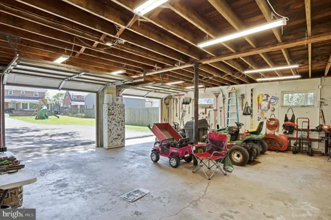 a view of a garage with lots of stuff