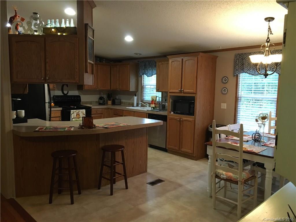 5125 Cabal Road Sharon, SC 29742 - Photo 12 of 21 a kitchen with a sink stove and refrigerator