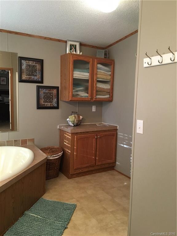 5125 Cabal Road Sharon, SC 29742 - Photo 17 of 21 a bathroom with a sink and a mirror
