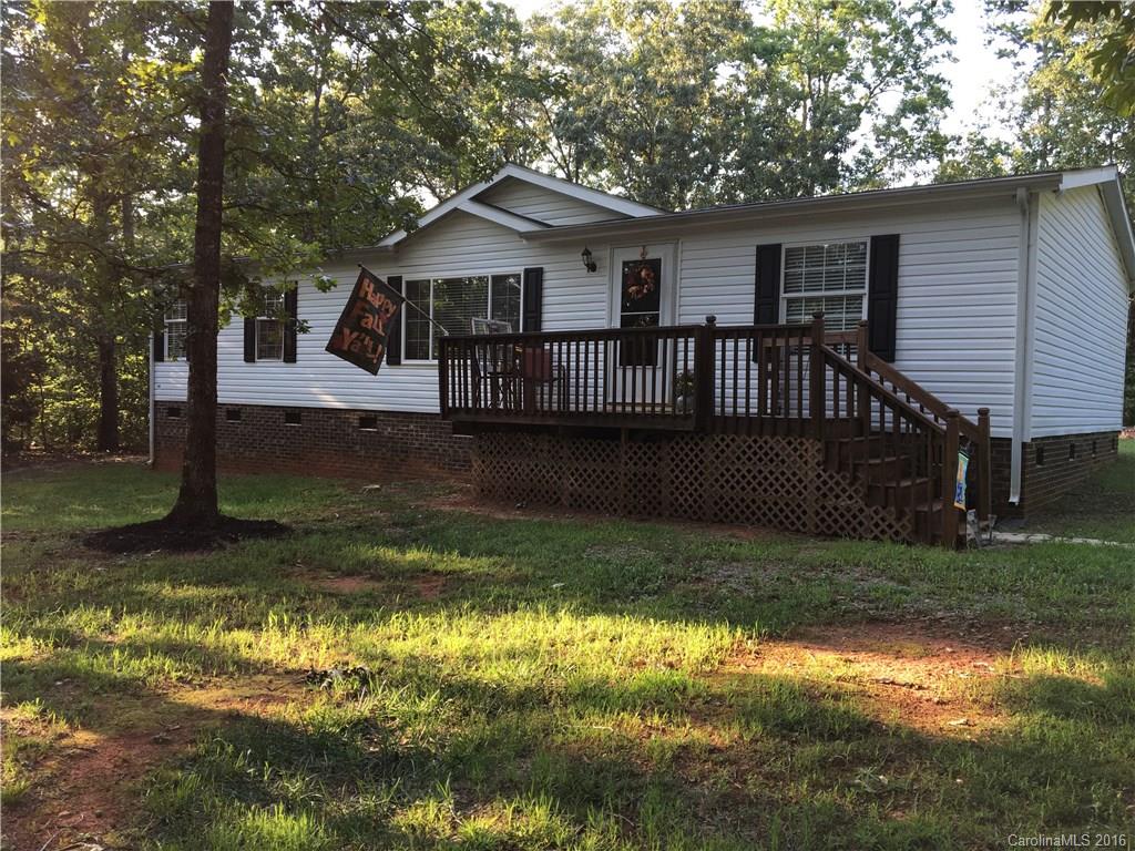 5125 Cabal Road Sharon, SC 29742 - Photo 4 of 21 a view of a house with a yard deck and a tree