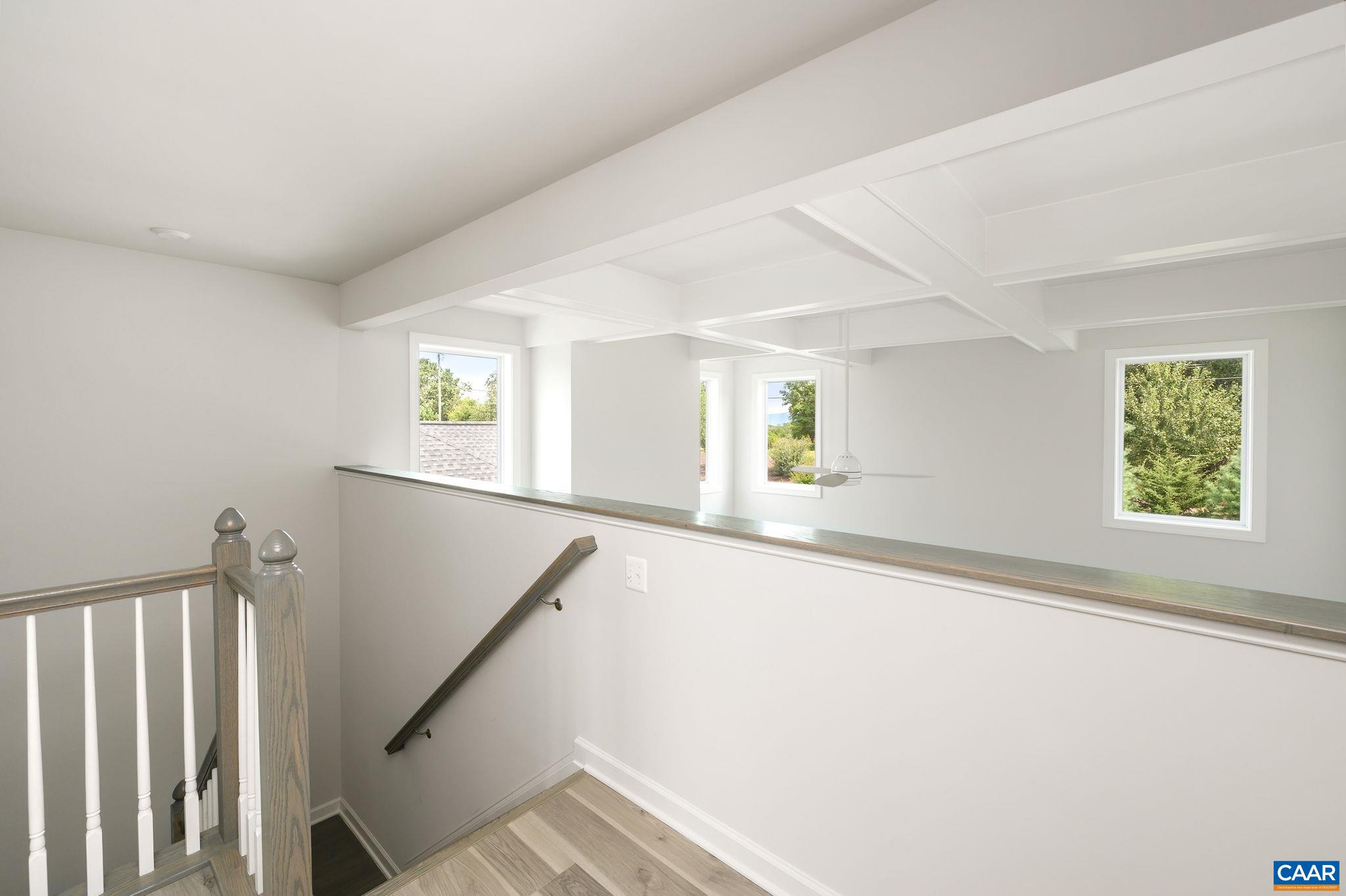 3526 Thicket Run Place Charlottesville, VA 22911 - Photo 19 of 36 a view of a hallway with windows