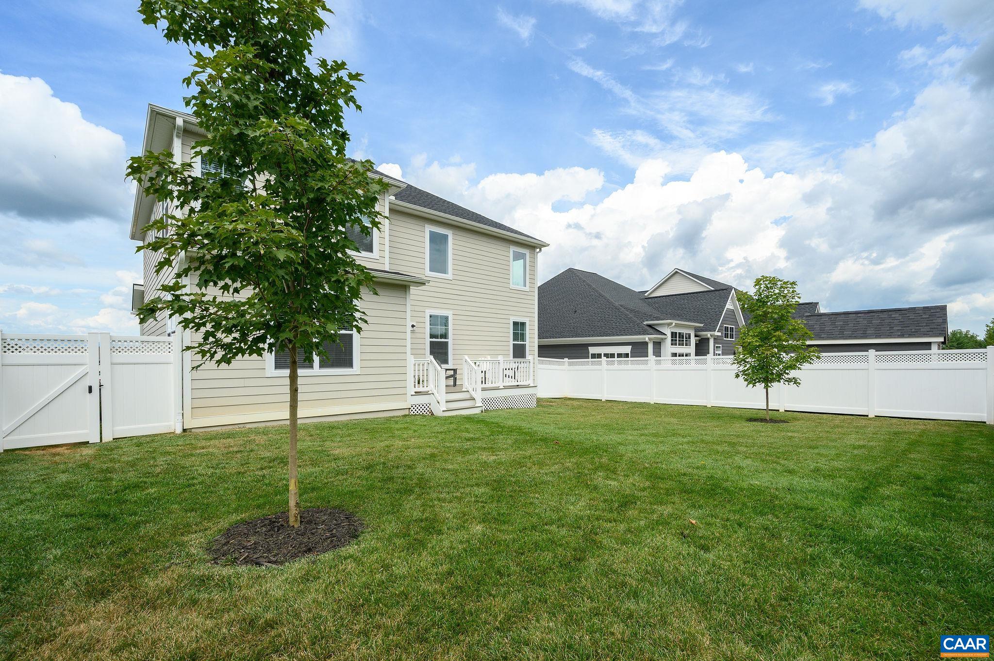 3526 Thicket Run Place Charlottesville, VA 22911 - Photo 29 of 36 a view of a house with a backyard