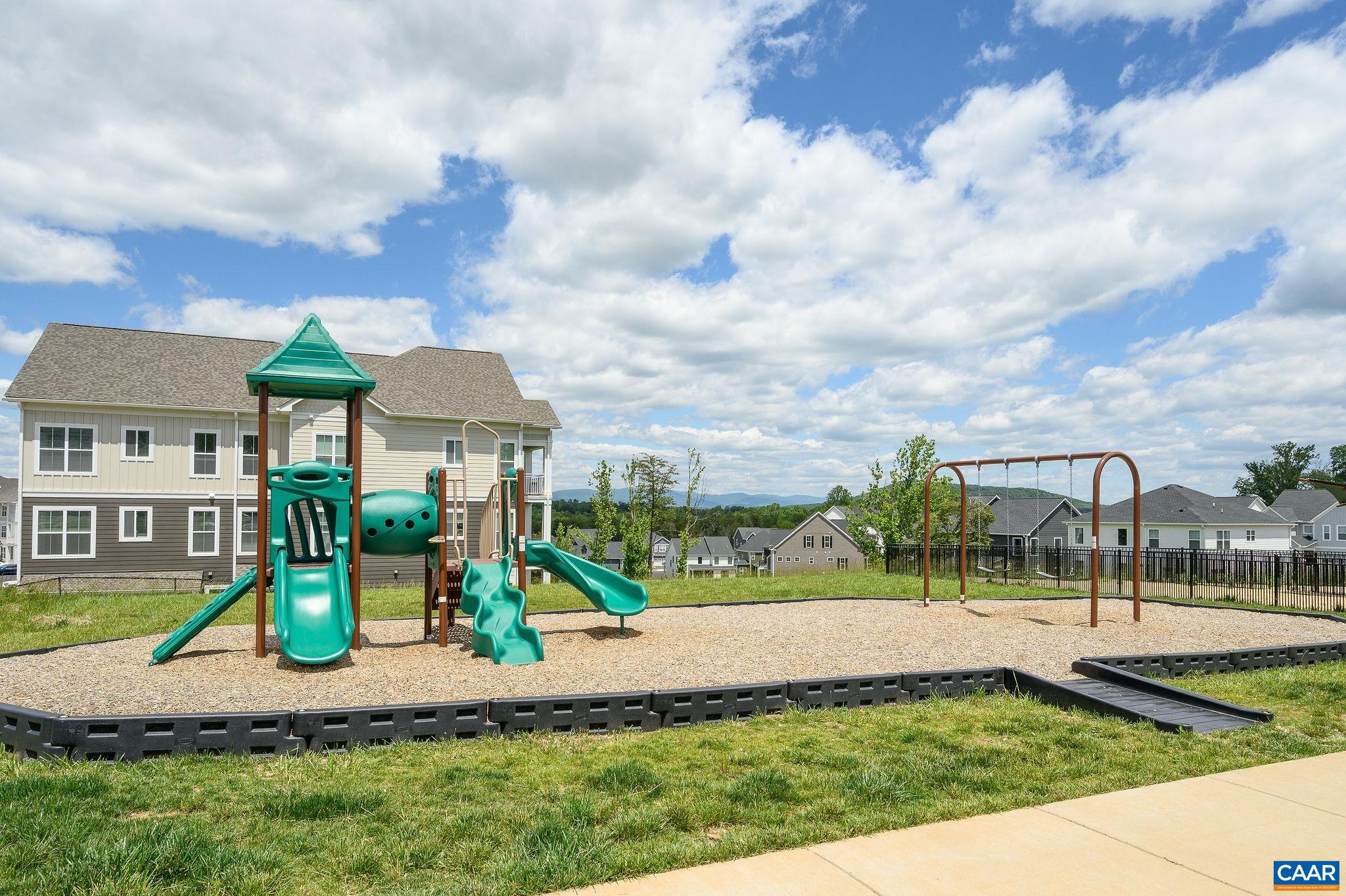 3526 Thicket Run Place Charlottesville, VA 22911 - Photo 35 of 36 a view of a park with swings and slides