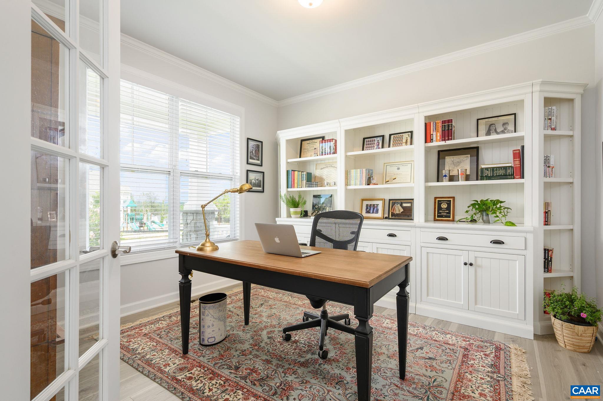 3526 Thicket Run Place Charlottesville, VA 22911 - Photo 7 of 36 a view of a workspace with furniture