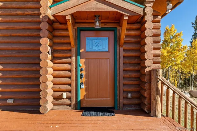 a bathroom with a sink a toilet a tub and shower
