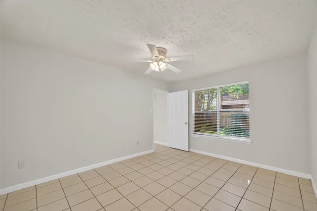 a bathroom with a double vanity sink and a bathtub