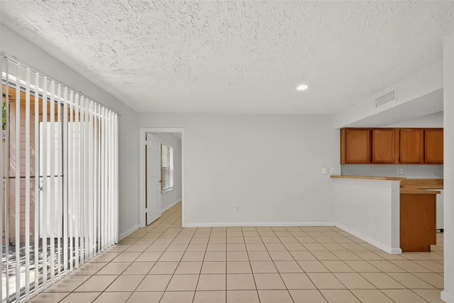 a kitchen with a refrigerator sink and stove