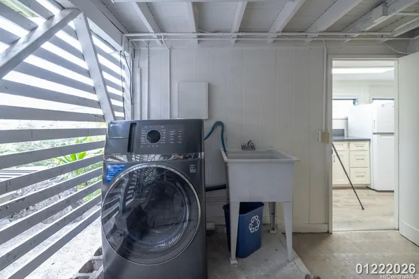 a utility room with dryer and washer