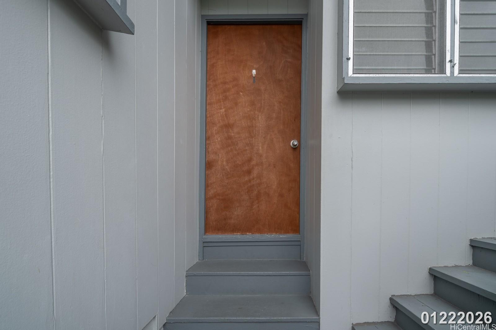 3033 Woolsey Place, Unit DOWNSTAIRS) Honolulu, HI 96822 - Photo 3 of 20 a view of front door