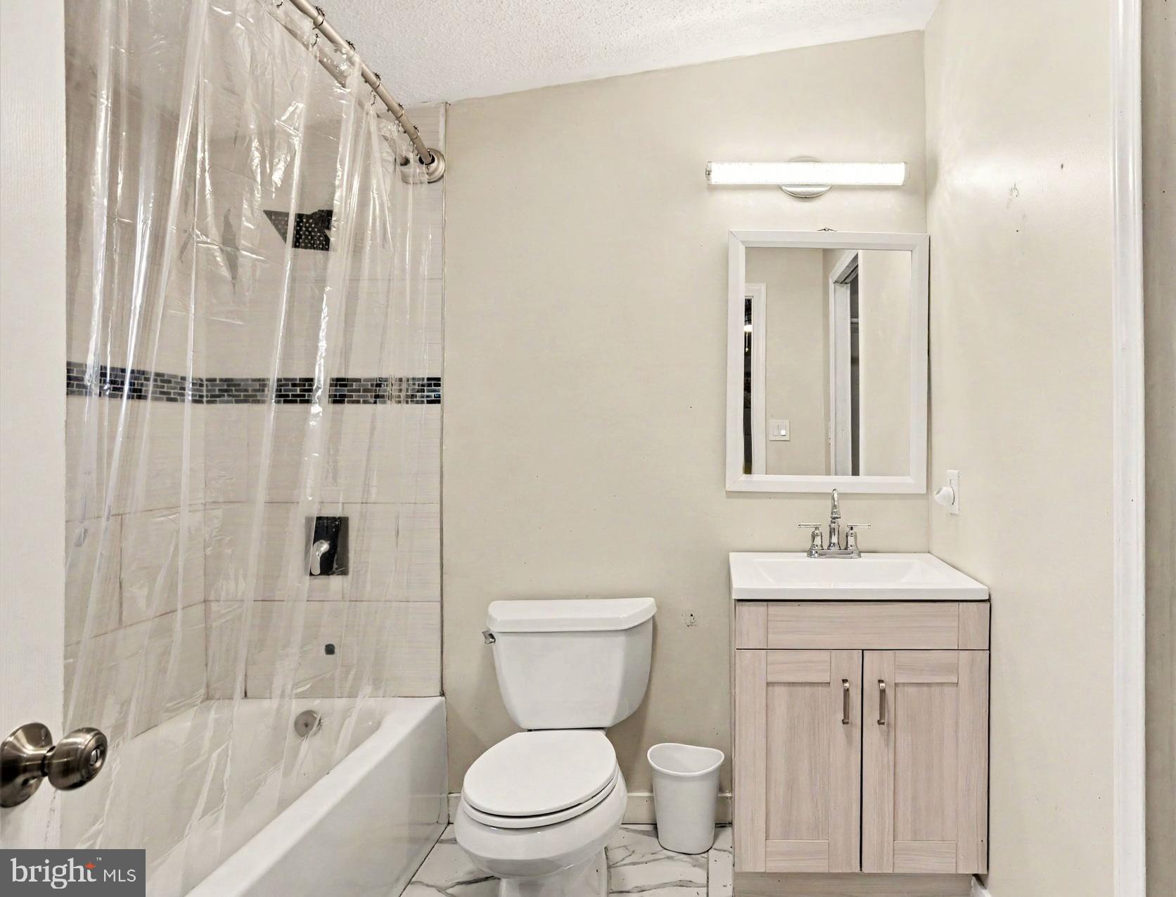 2002 David Drive Edgewood, MD 21040 - Photo 15 of 26 a bathroom with a sink toilet and shower