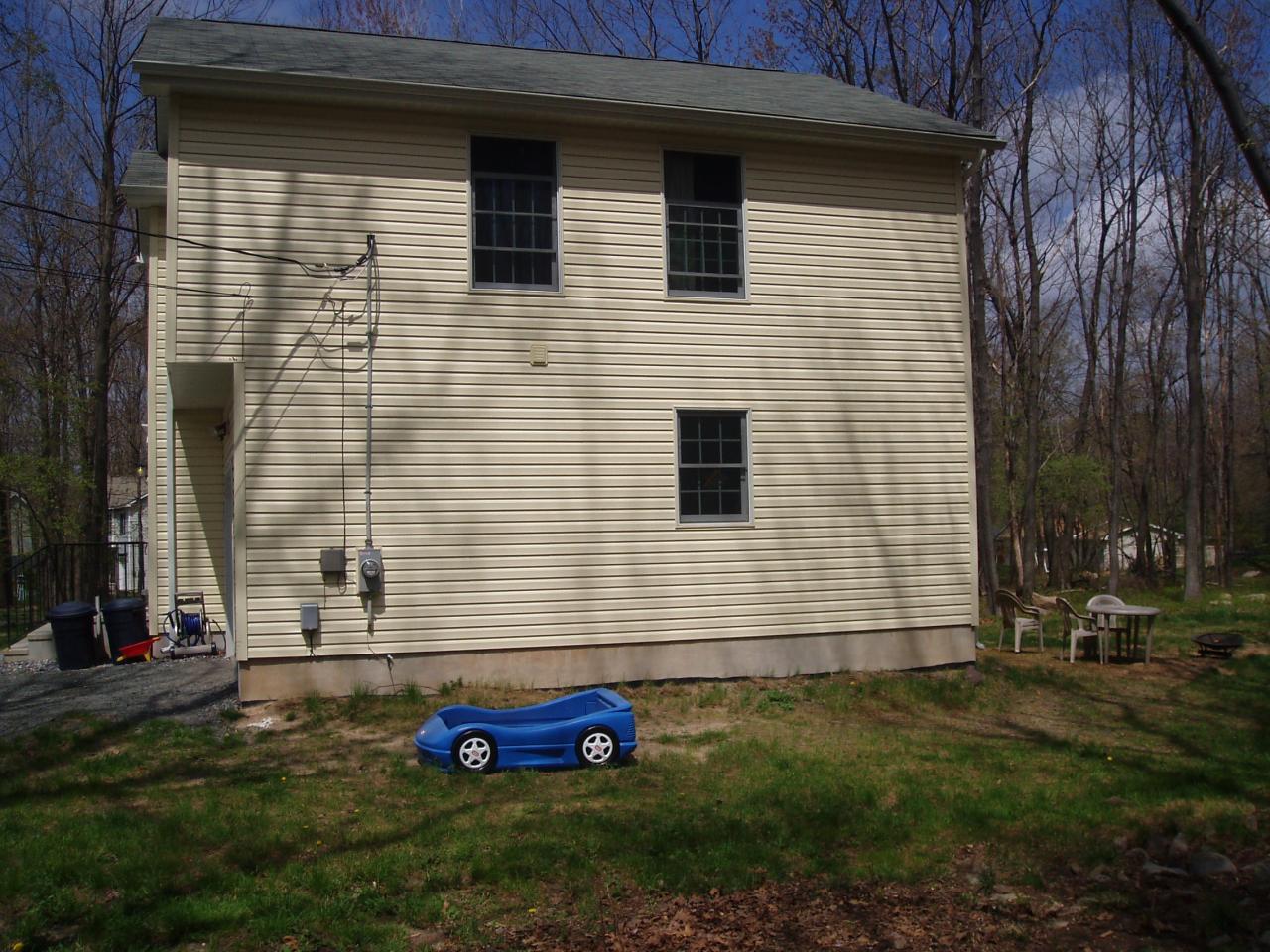 320 Deer Run Road Pocono Summit, PA 18346 - Photo 3 of 20 a view of backyard of the house