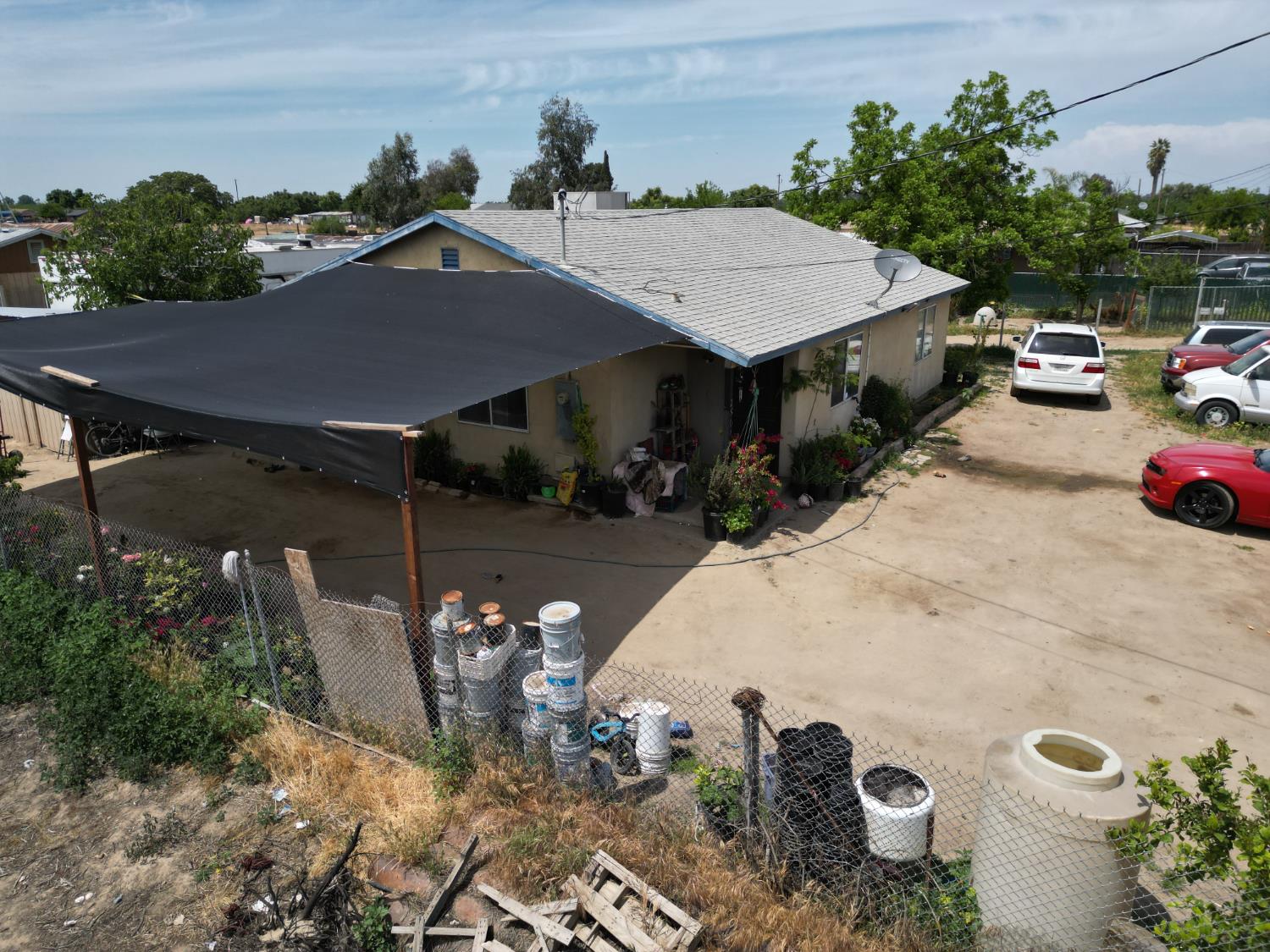 2501 South Marks Avenue Fresno, CA 93706 - Photo 3 of 11 a aerial view of a house with table and chairs in patio