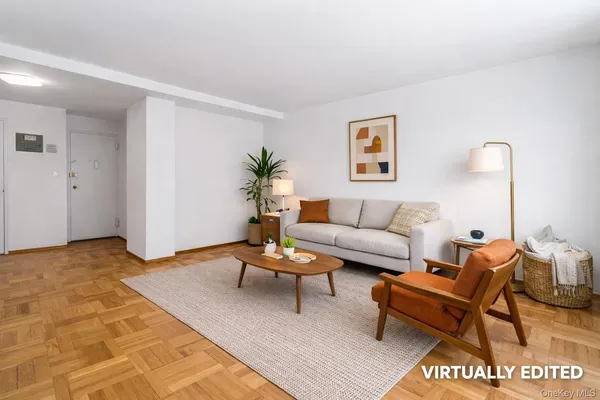 a living room with furniture and a rug