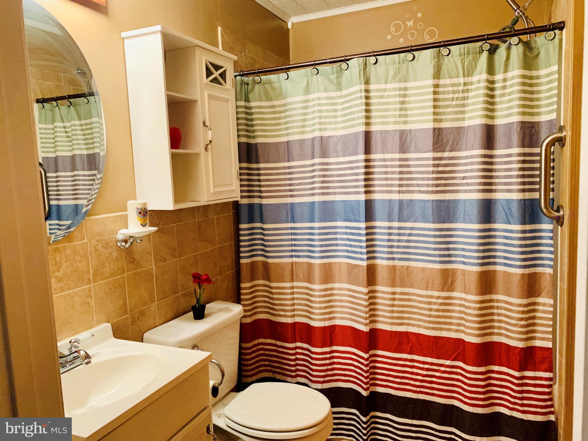 9490 Quail Run Road Denton, MD 21629 - Photo 11 of 35 Hall Bathroom