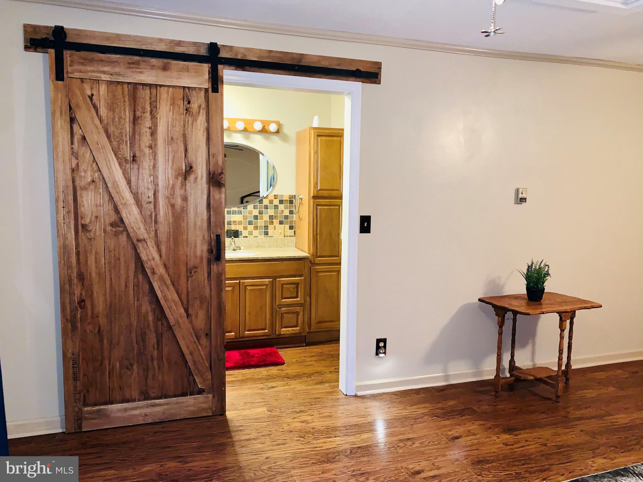 9490 Quail Run Road Denton, MD 21629 - Photo 16 of 35 Barn Door Upgrade to Master