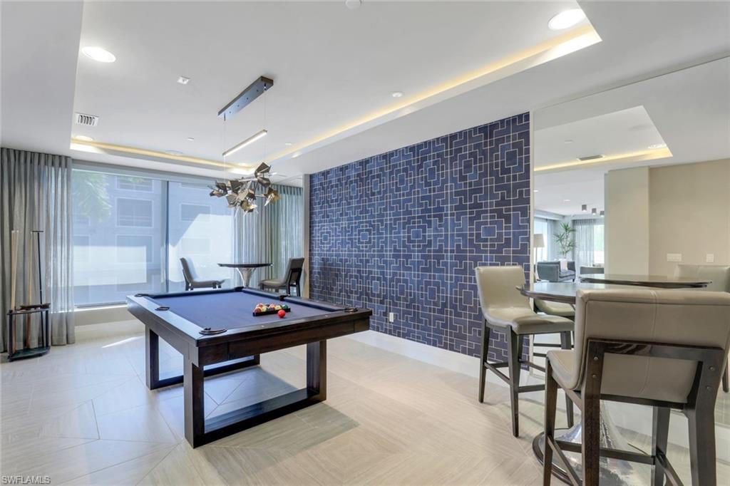 1135 3rd Avenue South, Unit 319 Naples, FL 34102 - Photo 5 of 19 a view of a furniture in a room